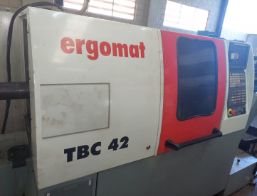 Foto: CENTRO DE TORNEAMENTO - ERGOMAT - TBC 42 - 6 EIXOS - ANO 2009 - Com Ferramentas Acionadas e Alimentador de Barras