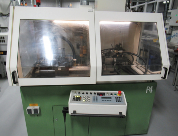Foto: RETIFICA CILINDRICA CNC PARA BLANKS DE METAL DURO  ROLLOMATIC ALTA PRODUÇÃO -MODELO 148 NP4 - ANO 2000