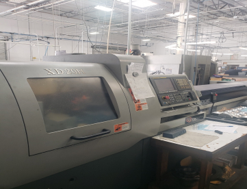 Foto: TORNO CNC AUTOMÁTICO DE CABEÇOTE MÓVEL - HANWHA - XD20H - ANO 2010 - COM ALIMENTADOR DE BARRAS