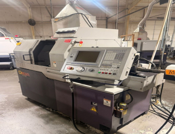 TORNO CNC DE CABEÇOTE MÓVEL - CITIZEN - L20 EVlll - ANO 2004 - COM ALIMENTADOR DE BARRAS DE 4 MTS - COM BOMBA DE ALTA PRESSÃO - COLETOR DE NÉVOA