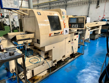Foto: TORNO CNC AUTOMÁTICO DE CABEÇOTE MÓVEL   HANWHA   XD20H   ANO 2008 - COM ALIMENTADOR DE BARRAS