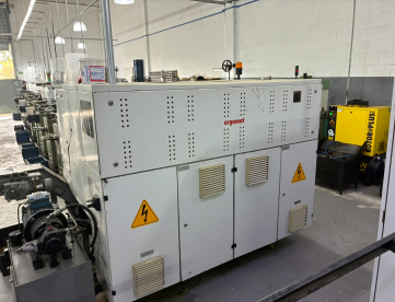 Foto: CENTRO DE TORNEAMENTO ERGOMAT TND180 -COMANDO FANUC-COM TRANSPORTADOR DE CAVACO  ANO 2009
