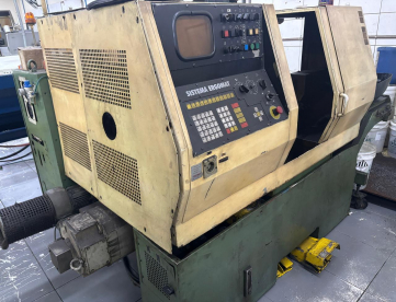 Foto: CENTRO DE TORNEAMENTO TRAUB -TND-160 -MAQUINA TRABALHANDO -ANO 1992