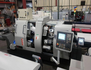 Foto: TORNO CNC AUTOMÁTICO DE CABEÇOTE MOVEL HANWHA STL32H/J 12 EIXOS -COM ALIMENTADOR DE BARRAS -ANO 2013
