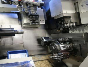 Foto: TORNO CNC AUTOMÁTICO DE CABEÇOTE MOVEL HANWHA STL32H/J 12 EIXOS -COM ALIMENTADOR DE BARRAS -ANO 2013