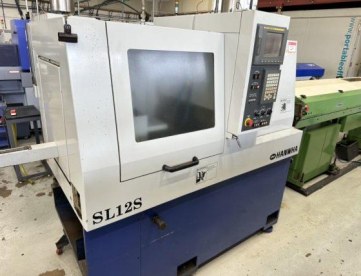 TORNO AUTOMATICO DE CABEÇOTE MOVEL  MARCA HANWHA   MODELO SL12S -COM ALIMENTADOR AUTOMÁTICO DE BARRAS - ANO 1997