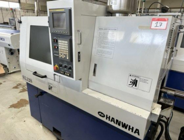 Foto: TORNO AUTOMATICO DE CABEÇOTE MOVEL  MARCA HANWHA   MODELO SL12S -COM ALIMENTADOR AUTOMÁTICO DE BARRAS - ANO 1997
