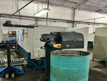 Foto: CENTRO DE TORNEAMENTO TORNO CNC ROMI GALAXY 30 - 320MM X 1020MM - ANO 2004