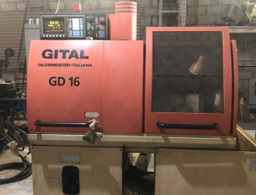 Foto: TORNO CNC CABEÇOTE MÓVEL - GILDEMEISTER - GD16 - COM ALIMENTADOR DE BARRAS IEMCA MINI BOSS 325 CNC - ANO 1999