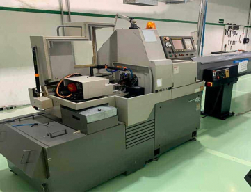 TORNO CNC AUTOMÁTICO DE CABEÇOTE MOVEL - CITIZEN - CINCOM A16 -COM ALIMENTADOR DE BARRAS - ANO 2006