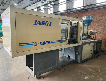 INJETORA DE PLÁSTICOS - JASOT - 880/180 TONELADAS - ANO 2010